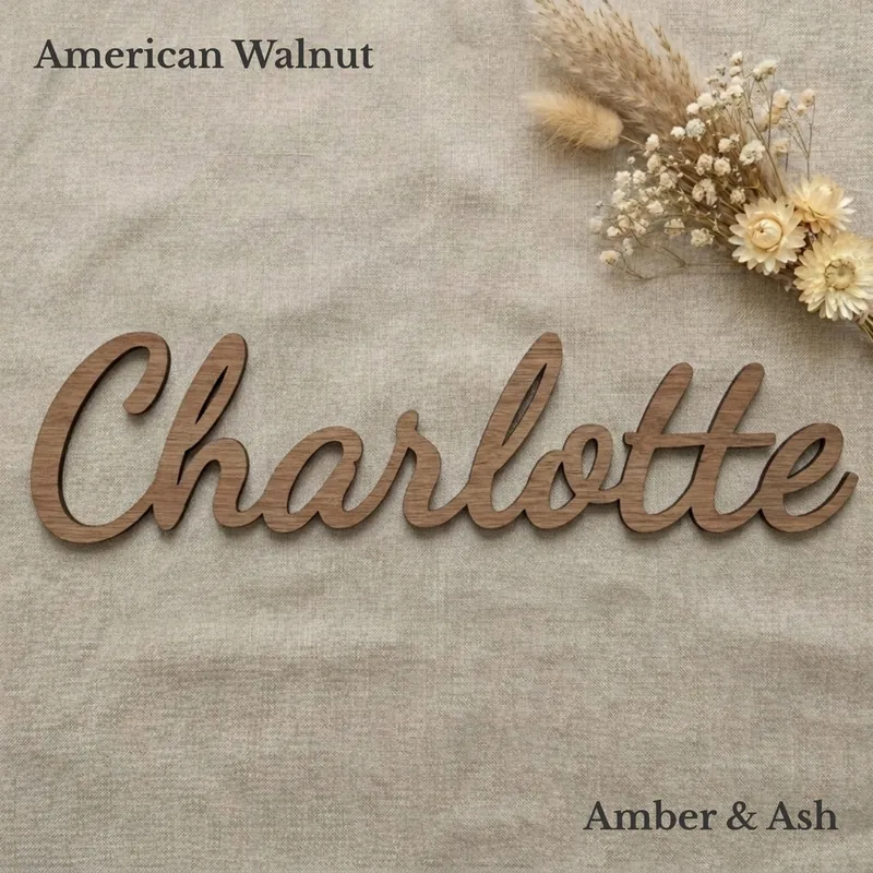 Charlotte name sign in the Swirly font, in American walnut veneer